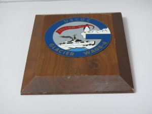 A ship's plaque bearing the coat of arms of the Coast Guard Cutter Glacier commemorates one of many visits by the icebreaker to Palmer Station during the 1970s and 1980s.