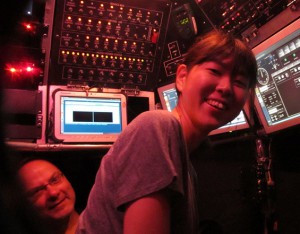 Sayaka Mino in the pilot seat of Alvin (with Stefan Sievert peeking from behind)