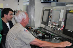 From this station, Rich and Anton can monitor thousands of electrical connections and a state of the art fire detection/suppression system. The ship can even be controlled form here using the joysticks to the left side of the console