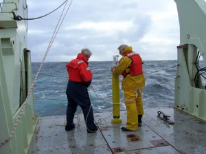 Will Ostrom and Jim Valdes prepare to launch the last profiling float into an eddy. (Photo by Alison Heater, Woods Hole Oceanographic Institution)