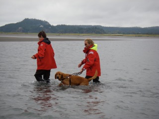Whit, Britt, and PhD student Vera Pavel crossing a channel on the Skagit tidal flats. Photo taken by Jim Thomson (prior JP student now at UW).