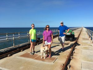 Hugger and me enjoying the cool breeze on the FRF pier, with JP student Suzi Clark (left) and Res. Assoc. III Paul Henderson (right). Its 95F, but the ocean, which is only 63F is wonderful.