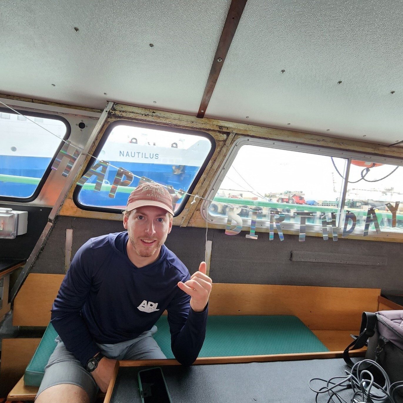 Ian pictured on a boat. Photo provided by Ian.