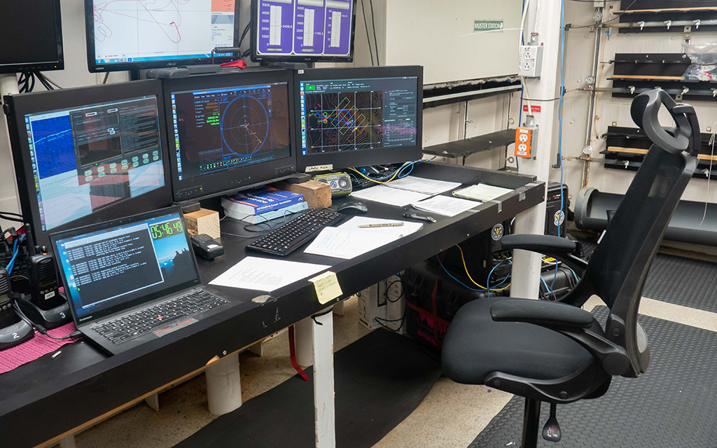 General setting of the AUV Sentry "watch" station. The rightmost screen shows NavG v.2 (Photo by Manyu Belani)